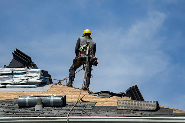 Professional Roofing technician working in Dewar, IA